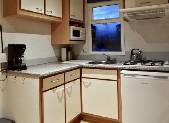 Quiet location of mobile home with 3 bedrooms in Erezee, Ardennes, surrounded by greenery.