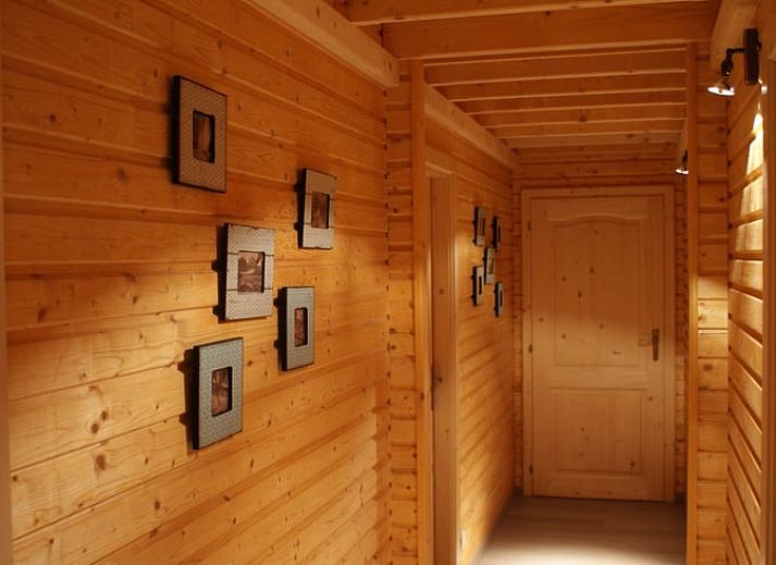 Cottage in Erezee, a charming cottage in the Ardennes, Luxembourg, Belgium, surrounded by nature and rustic autumn colors.