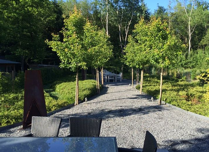 Cozy living room of Cottage in Erezee, located in the Ardennes, Belgium. Perfect vacation home with wooden interior and modern amenities.