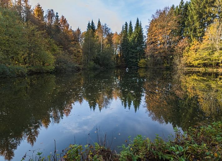 Veranda of cottage in Our, Ardennes, Belgium with spacious seating area.