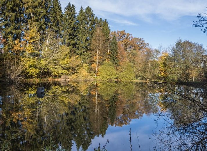 Veranda of cottage in Our, Ardennes, Belgium with spacious seating area.