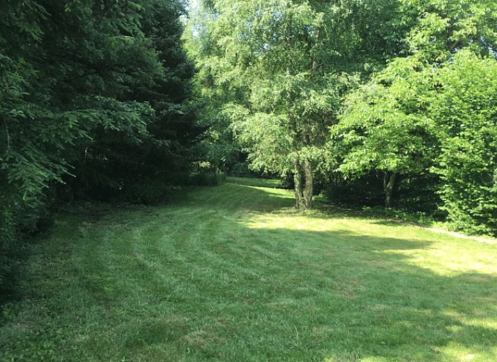 Rugged all-terrain vehicle next to Holiday home in Our, Ardennes, Belgium, ideal for adventurers.