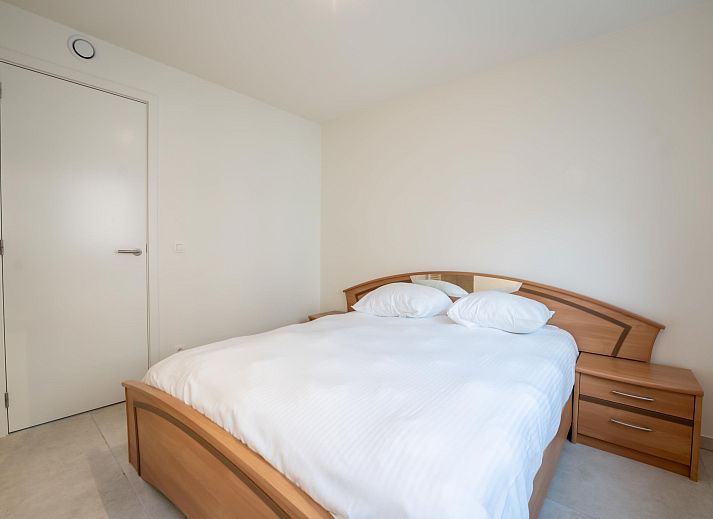 Geniet van het uitzicht over Blankenberge vanaf het balkon van Appartement Richard I, een comfortabel appartement aan de Belgische kust.