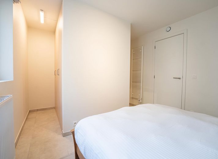 Geniet van het uitzicht over Blankenberge vanaf het balkon van Appartement Richard I, een comfortabel appartement aan de Belgische kust.