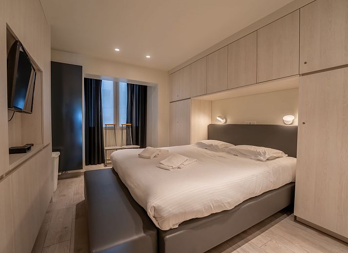 Luxury bedroom in Apartment Bella II, Blankenberge, Belgian coast, with modern interior and comfortable amenities.