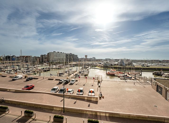 Attractive bedroom in Apartment Bella II overlooking the harbor, located in Blankenberge on the Belgian coast.