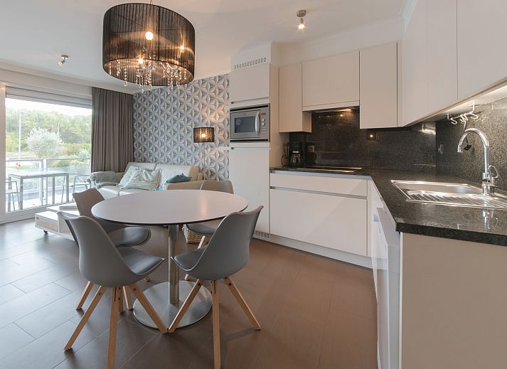 Stylish living room in Apartment Sea Breeze, Bredene, Belgian coast, with modern decor and views of the surroundings.