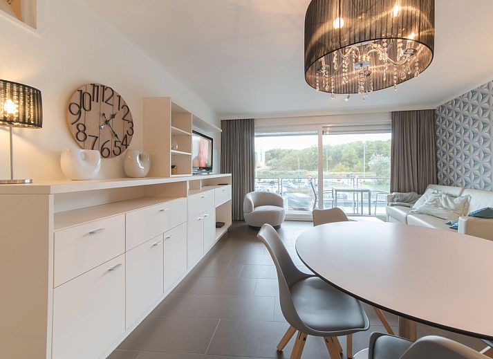 Stylish living room in Apartment Sea Breeze, Bredene on the Belgian coast, with modern furnishings and comfortable seating area.
