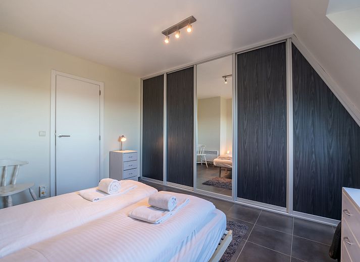 Cozy living room in Apartment Marebelle, Bredene, Belgian coast, with modern decor and open kitchen for a relaxing stay.
