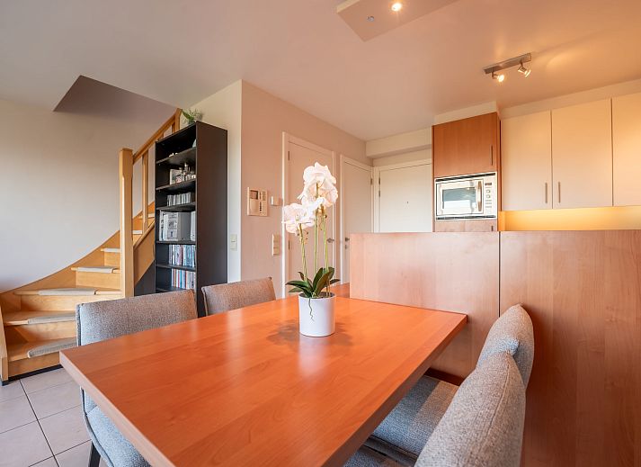 Cozy living room in Apartment Marebelle, Bredene, Belgian coast, with modern decor and open kitchen for a relaxing stay.