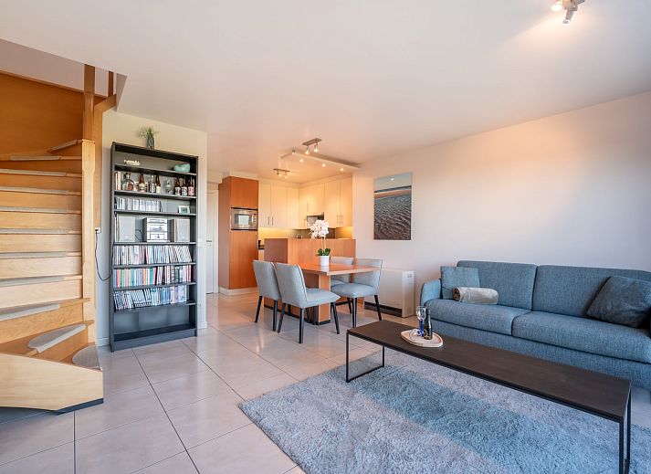 Cozy living room in Apartment Marebelle, Bredene, Belgian coast, with modern decor and open kitchen for a relaxing stay.