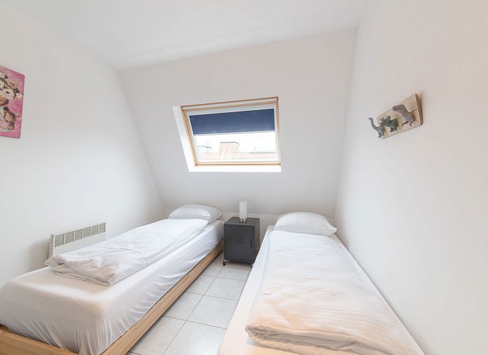 Geniet van het uitzicht vanaf het balkon van Appartement Ter Duinen in Bredene aan de Belgische kust, ideaal voor een ontspannen verblijf.