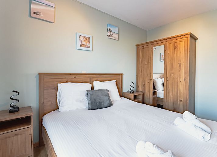 Enjoy the balcony of Apartment Zandloper in Bredene on the Belgian coast-the perfect spot for relaxing moments in a charming vacation home.