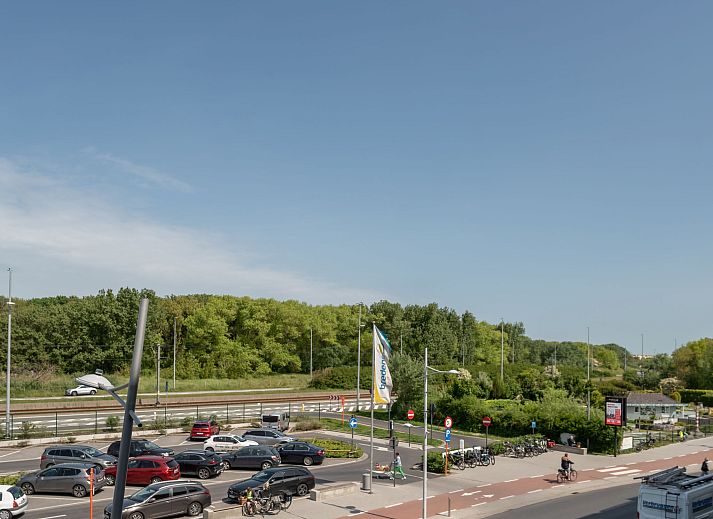 Enjoy the view from the balcony of Apartment Lautrec in Bredene on the Belgian coast, a comfortable vacation home.