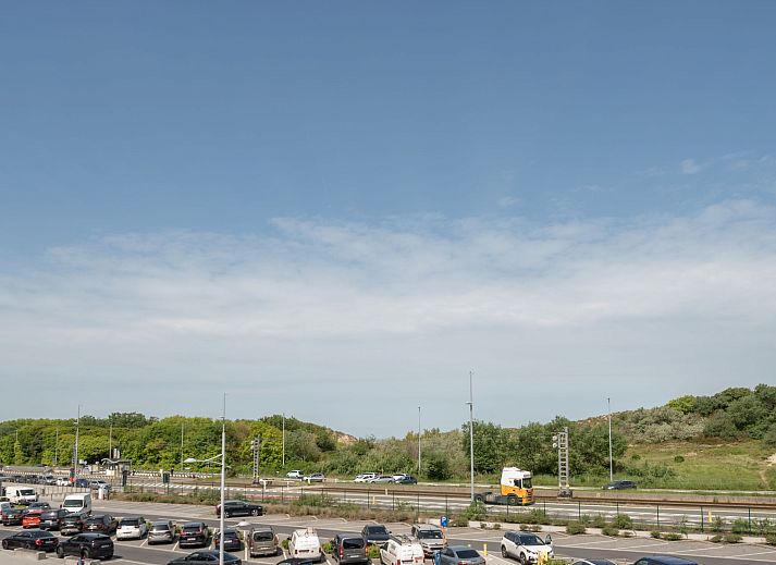 Enjoy the view from the balcony of Apartment Lautrec in Bredene on the Belgian coast, a comfortable vacation home.