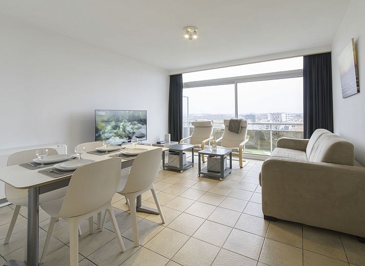 Cozy living room of Apartment Seaview 2 in Bredene, Belgian coast, with modern furnishings and comfortable seating area.