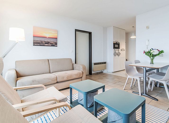 Cozy living room of Apartment Seaview 2 in Bredene, Belgian coast, with modern furnishings and comfortable seating area.