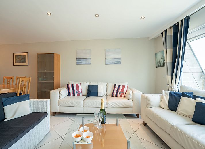 Cozy living room of Apartment Queen Mary in Bredene on the Belgian coast, with modern furnishings and comfortable seating area.
