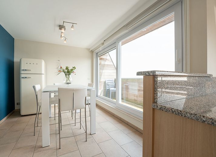 Cozy living room of Apartment Queen Mary in Bredene on the Belgian coast, with modern furnishings and comfortable seating area.