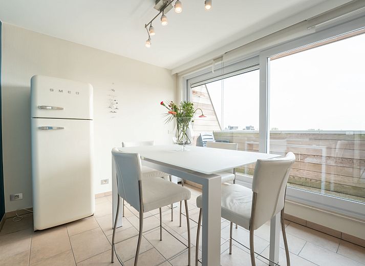 Cozy living room of Apartment Queen Mary in Bredene on the Belgian coast, with modern furnishings and comfortable seating area.