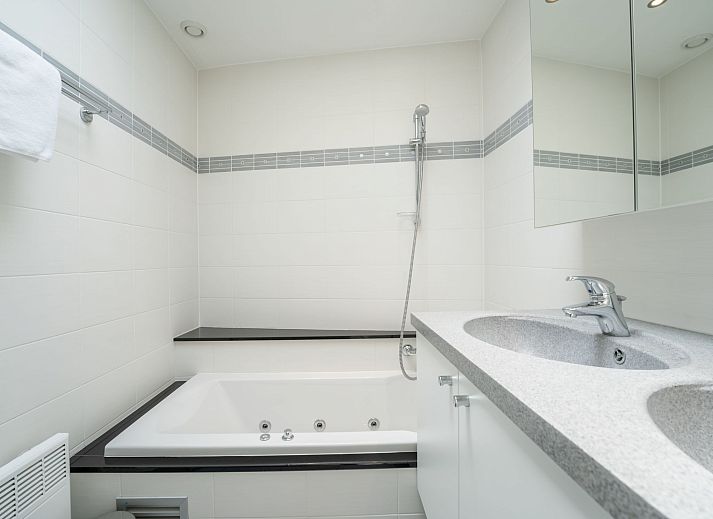 Bright and comfortable bedroom in Apartment Queen Mary, Bredene, Belgian coast, ideal for a relaxing stay.