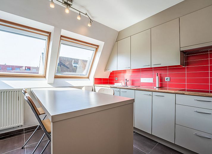 Stylish living room of Apartment Ter Duyne in Bredene, Belgian coast, with modern furnishings and comfortable seating area.