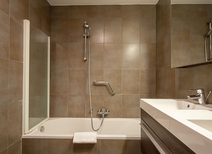 Bedroom in Apartment Ter Duyne, Bredene, Belgian coast. Spacious room with skylights and modern interior for a relaxing stay.