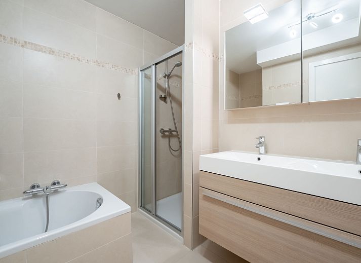 Modern kitchen in Apartment Parklane, Bredene, Belgian coast, with spacious layout and terrace view.