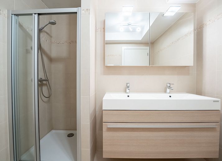 Modern kitchen in Apartment Parklane, Bredene, Belgian coast, with spacious layout and terrace view.
