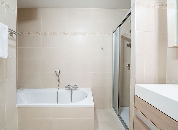 Attractive bedroom in Apartment Parklane, Bredene on the Belgian coast, with modern decor and natural light.
