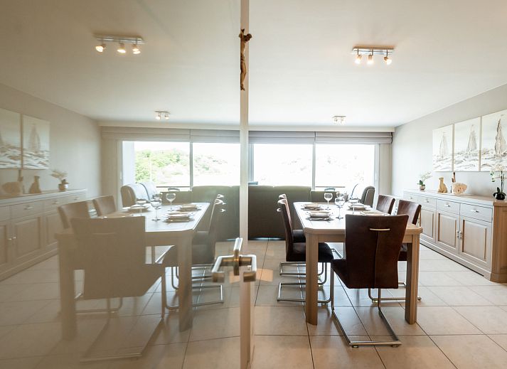 Cozy living room of Apartment Lautrec 304 in Bredene, Belgian coast, with comfortable sitting area and dining area.