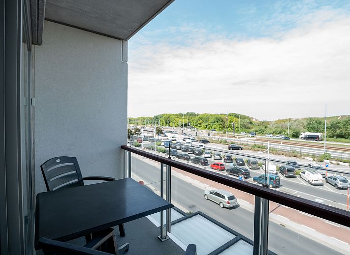 Cozy living room of Apartment Lautrec 304 in Bredene, Belgian coast, with comfortable sitting area and dining area.