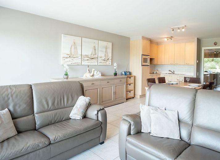 Cozy dining area in Apartment Lautrec 304 in Bredene, Belgian coast, with modern kitchen and stylish decor.