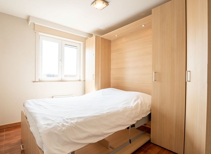 Stylish dining room in Apartment Lautrec 304 in Bredene, Belgian coast, with elegant decor and spacious views of the surroundings.
