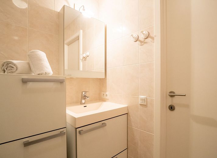 Stylish living room and dining area in Apartment Lautrec 304, Bredene, Belgian coast, ideal for a relaxing vacation stay.