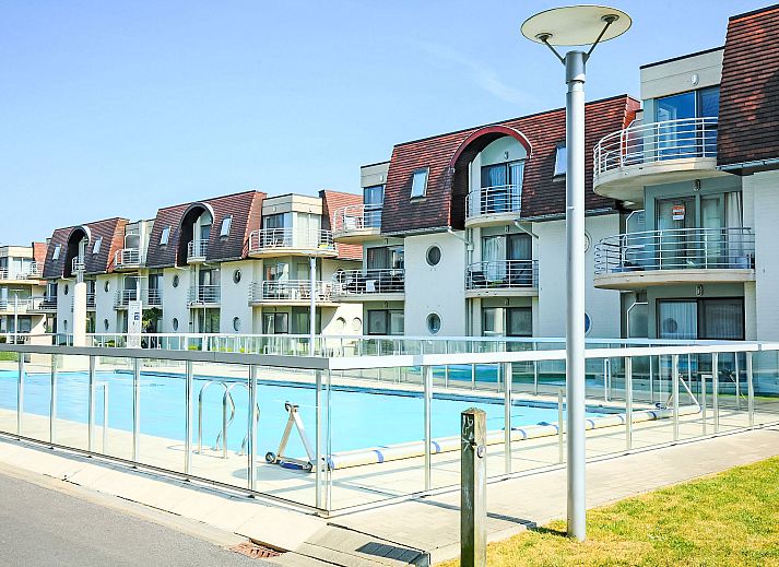 Cozy interior space of Apartment Firenze 011 in Bredene, Belgian coast, with comfortable sitting area and modern kitchen.