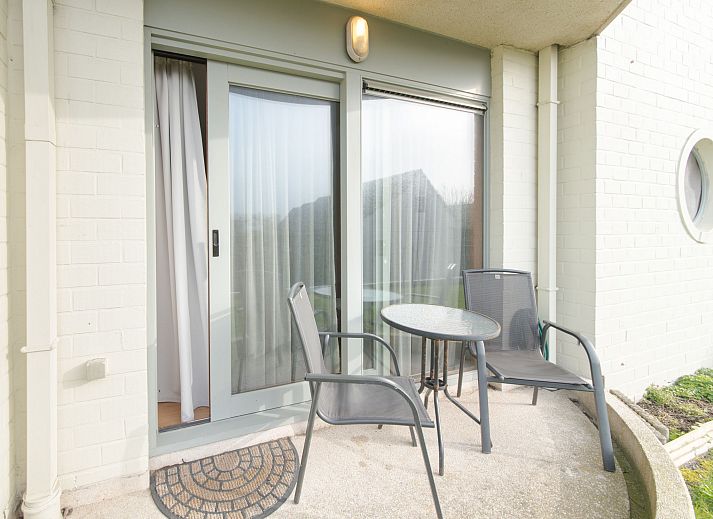 Cozy interior space of Apartment Firenze 011 in Bredene, Belgian coast, with comfortable sitting area and modern kitchen.