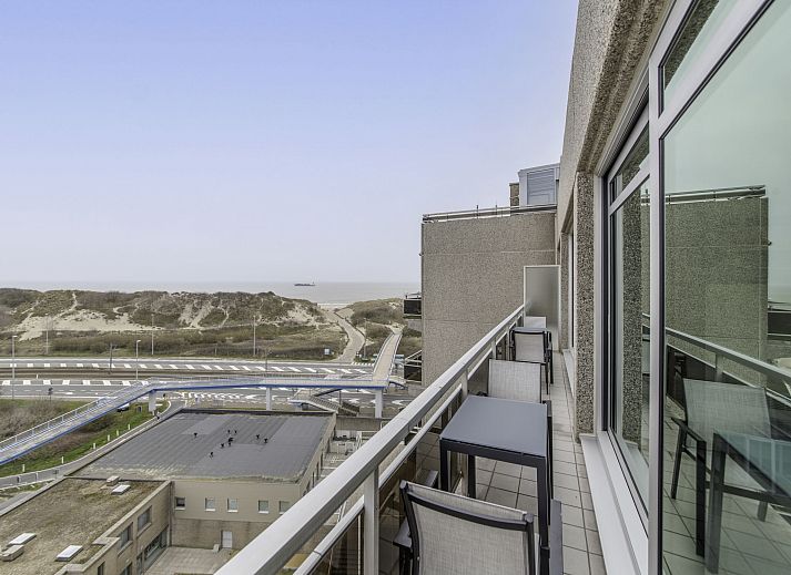 Spacious living room of Apartment Seaview 4 in Bredene, Belgian coast, ideal vacation accommodation with comfortable sitting area and modern furnishings.