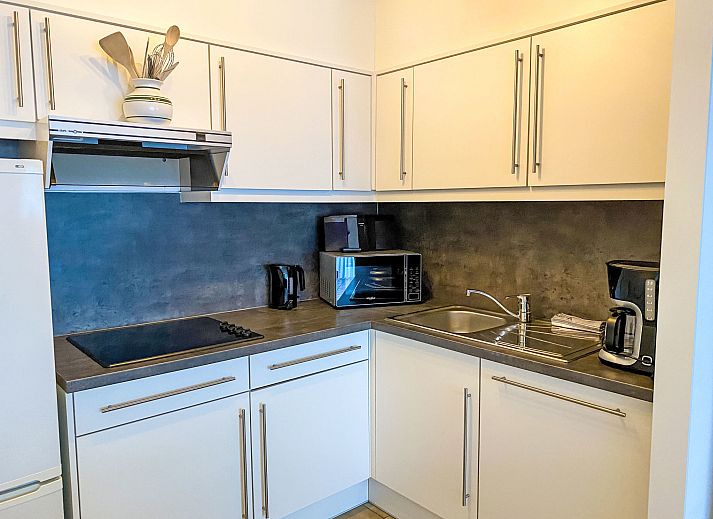 Luxury bathroom in Apartment 103, Bredene, Belgian coast, with modern shower and stylish sink for a comfortable stay.