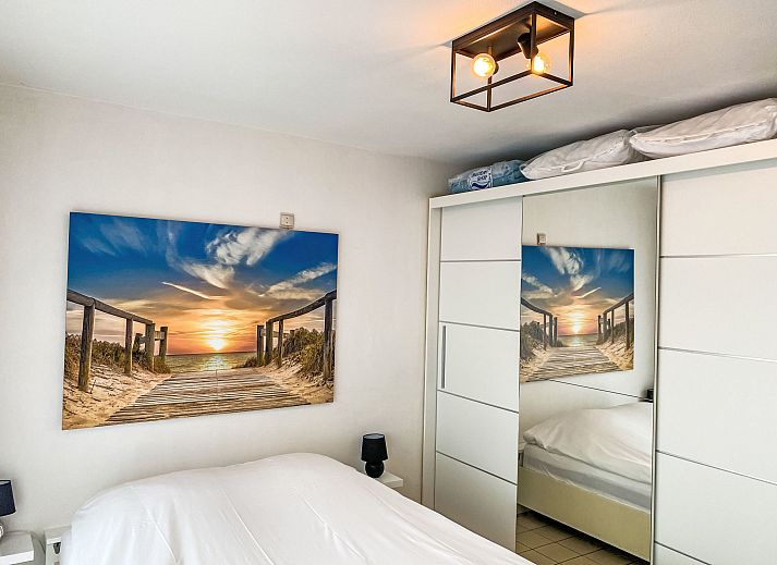 Enjoy the sunny terrace at Apartment 103 in Bredene, Belgian coast. Perfect for a relaxing stay by the sea.