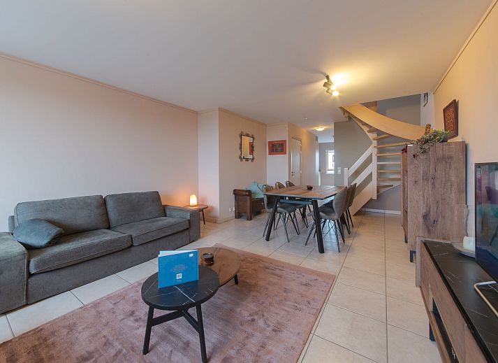 Cozy interior space of Apartment Meiboom 503 in Bredene, Belgian coast, with spacious sitting area and dining area.
