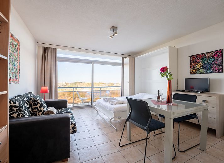 Enjoy the panoramic view from the balcony of Apartment Studio 62-705 in Bredene on the Belgian coast.