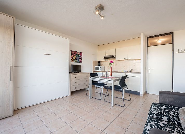 Enjoy the panoramic view from the balcony of Apartment Studio 62-705 in Bredene on the Belgian coast.