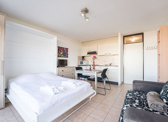 Enjoy the panoramic view from the balcony of Apartment Studio 62-705 in Bredene on the Belgian coast.