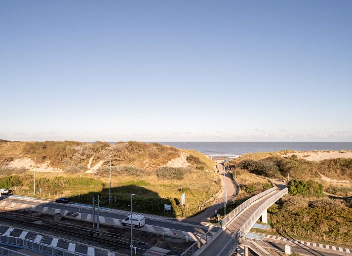 Cozy interior space of Apartment Studio 62-705 in Bredene, Belgian coast, with kitchen and comfortable sitting area.
