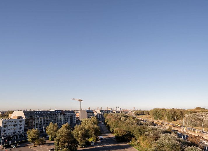 Cozy interior space of Apartment Studio 62-705 in Bredene, Belgian coast, with kitchen and comfortable sitting area.