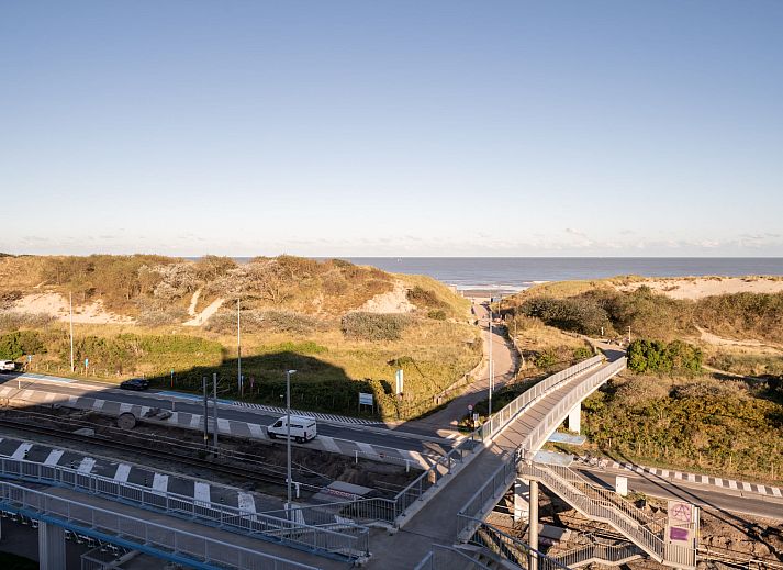 Cozy interior space of Apartment Studio 62-705 in Bredene, Belgian coast, with kitchen and comfortable sitting area.