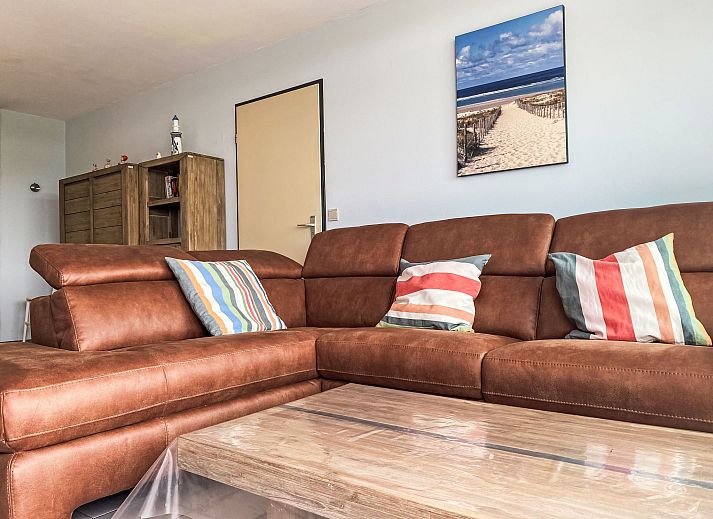Cozy dining area in Apartment Residentie Astrid, Bredene, overlooking nature on the Belgian coast.