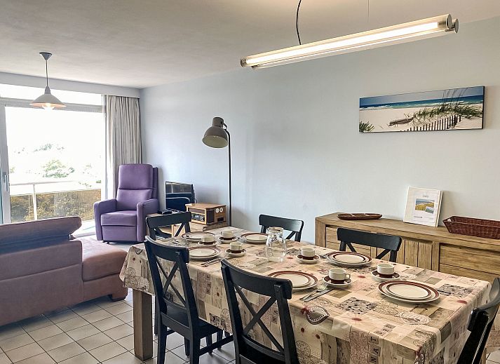 Cozy living room in Apartment Residentie Astrid, Bredene, Belgian coast, with comfortable sofa and coastal decor.