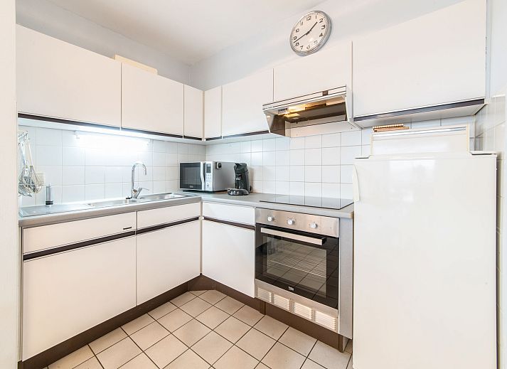 Cozy living room in Apartment Residentie Astrid, Bredene, Belgian coast, with comfortable sofa and coastal decor.